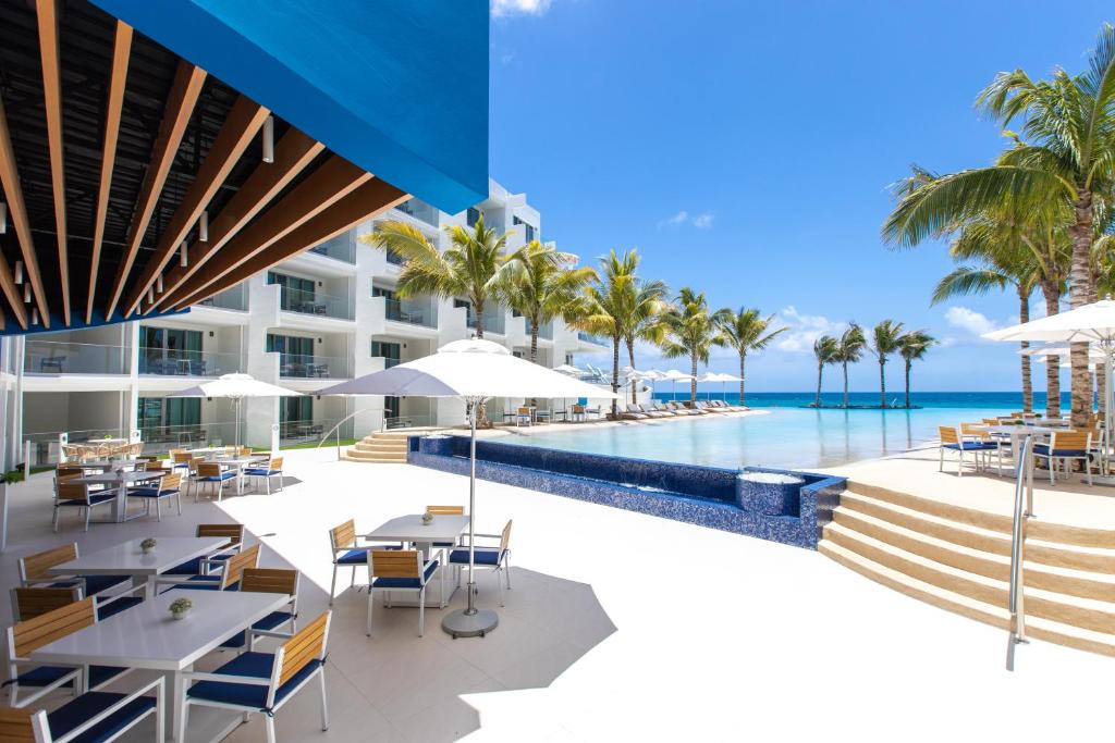 an image of the pool at the excellence paradiso resort at The Morgan Resort Spa & Village in Simpson Bay
