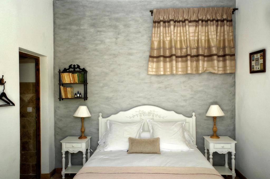 Postel nebo postele na pokoji v ubytování B&B Le Deffends de Redon
