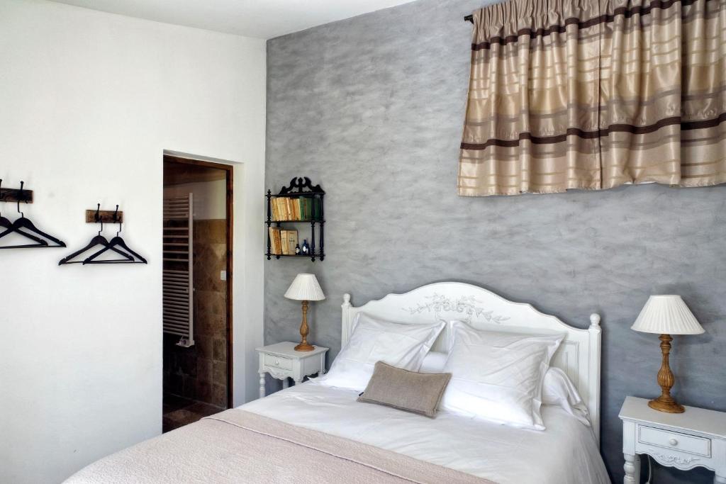 Postel nebo postele na pokoji v ubytování B&B Le Deffends de Redon