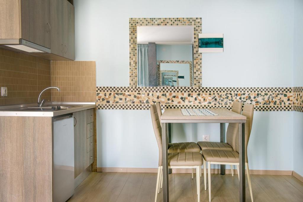 Kuchyň nebo kuchyňský kout v ubytování 3D iliadis Suites