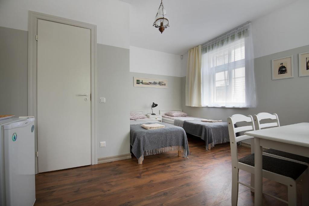 Postel nebo postele na pokoji v ubytování Promenaadi Villa