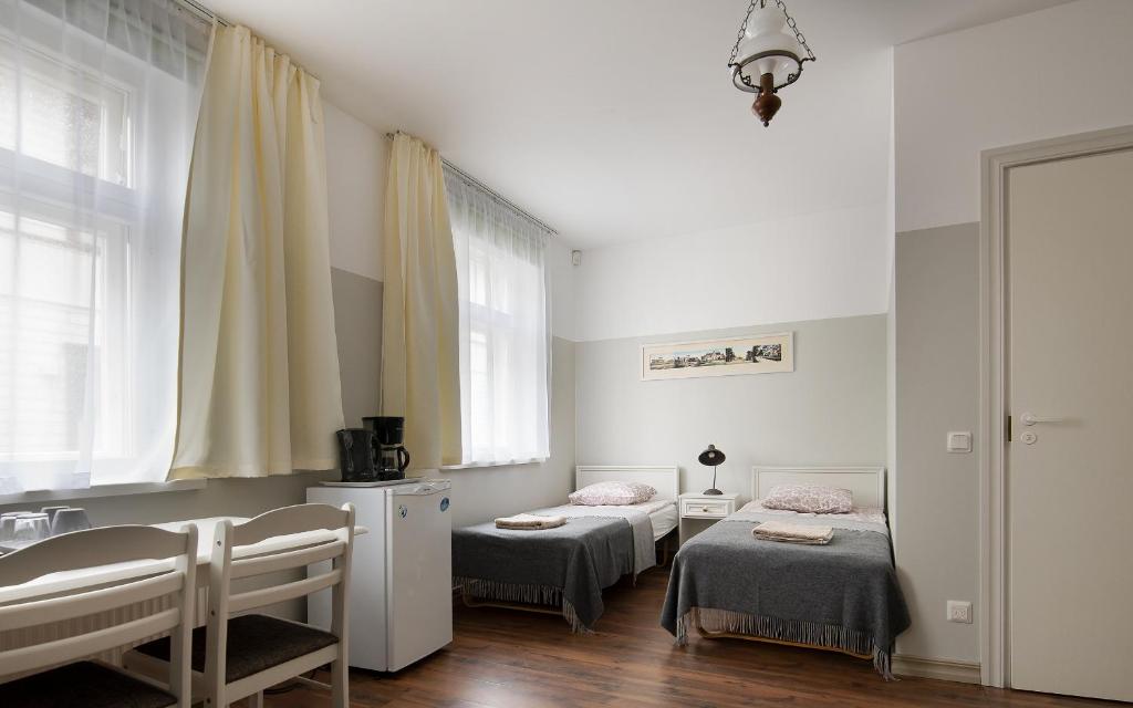 Postel nebo postele na pokoji v ubytování Promenaadi Villa