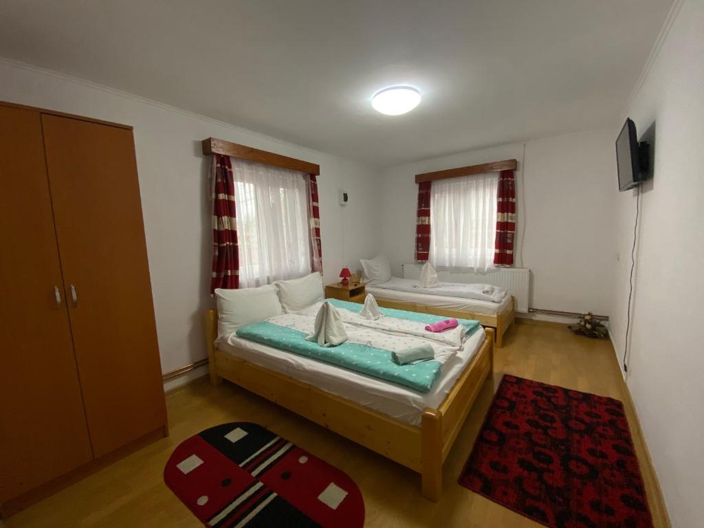 Postel nebo postele na pokoji v ubytování Dobra Haz