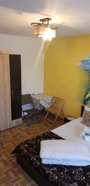 Postel nebo postele na pokoji v ubytování EL Capitano - Mamaia Nord