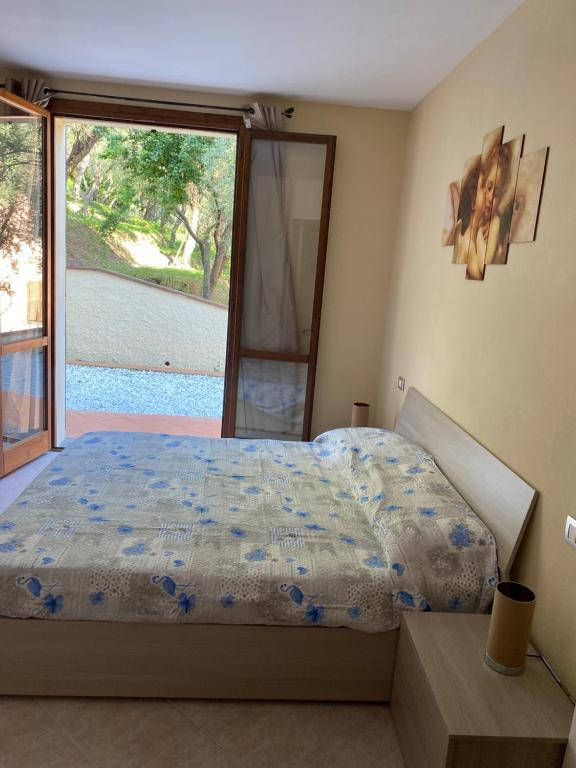 Een bed of bedden in een kamer bij Cinque Terre Casa Vacanze
