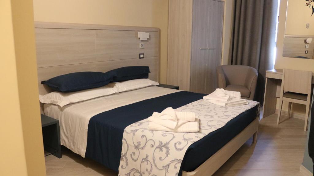 Postel nebo postele na pokoji v ubytování Dimora Del Corso
