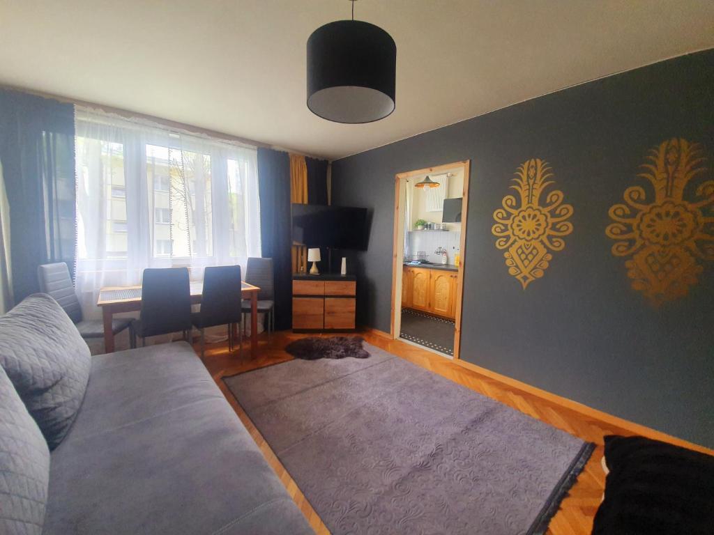 Posedenie v ubytovaní Apartament IZBA W CENTRUM