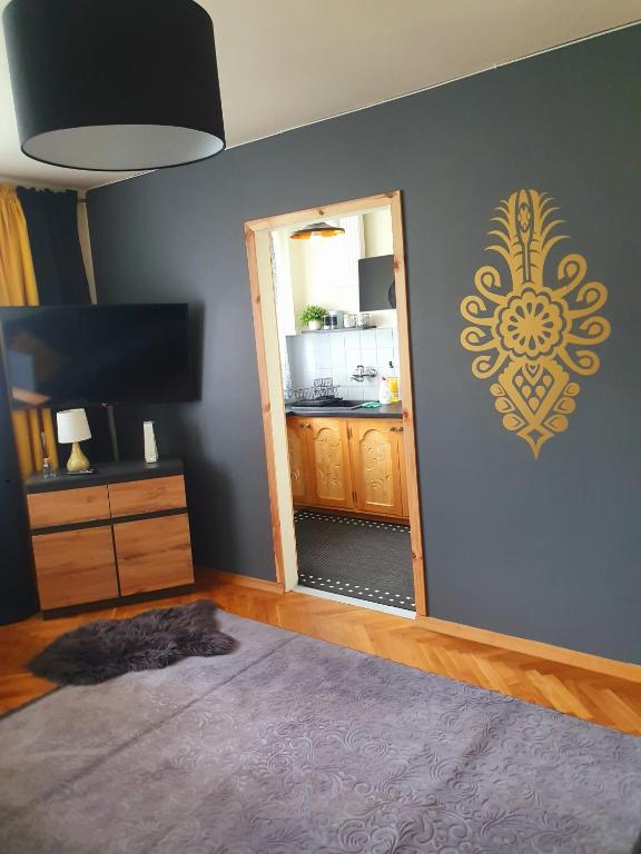 Kuchyňa alebo kuchynka v ubytovaní Apartament IZBA W CENTRUM