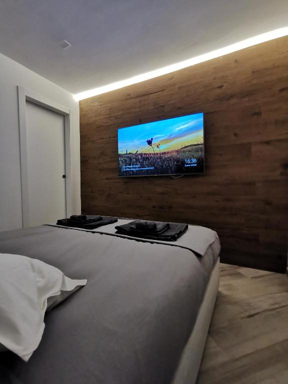 Televízia a/alebo spoločenská miestnosť v ubytovaní Aqua Apartment - very Ski In & Ski Out CIR 0436