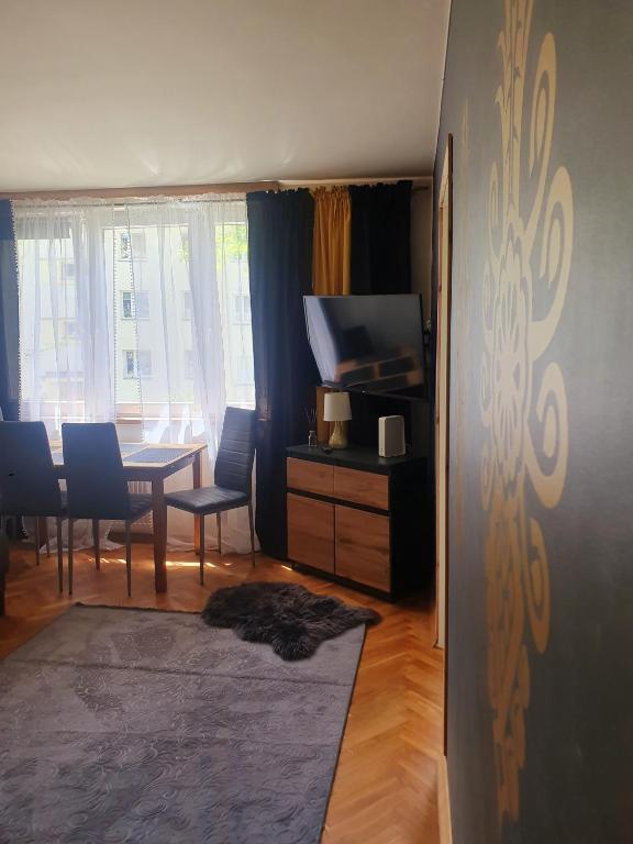 Posedenie v ubytovaní Apartament IZBA W CENTRUM