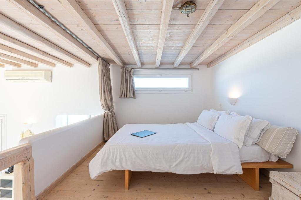 Posteľ alebo postele v izbe v ubytovaní Golden Sunset Villas
