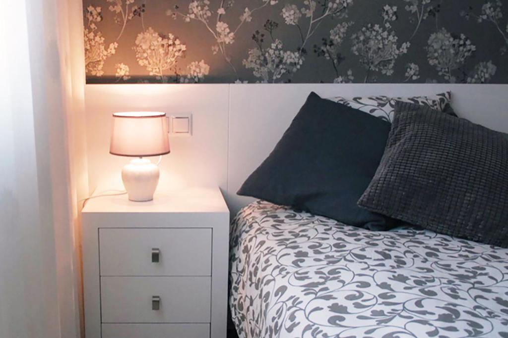 Postel nebo postele na pokoji v ubytování Silver Home