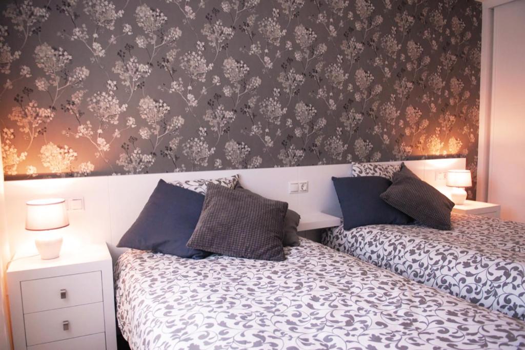 Postel nebo postele na pokoji v ubytování Silver Home