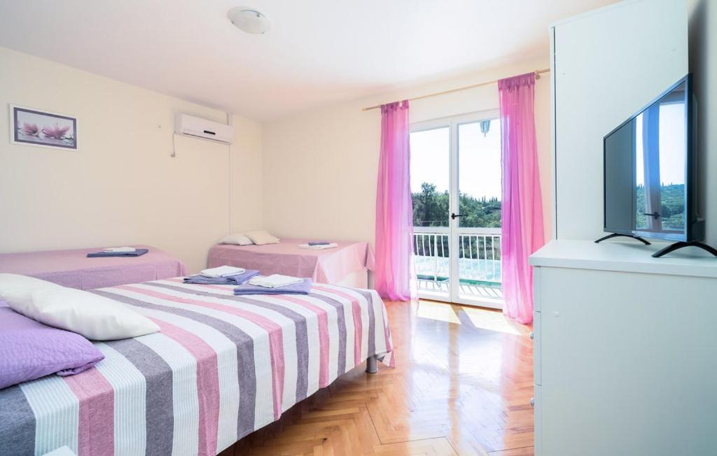 Posteľ alebo postele v izbe v ubytovaní Apartman Ana Marija