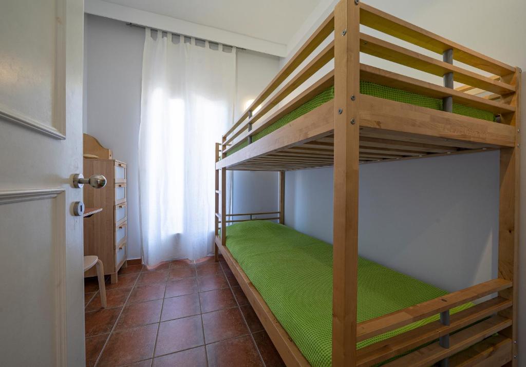 Postel nebo postele na pokoji v ubytování sidestory