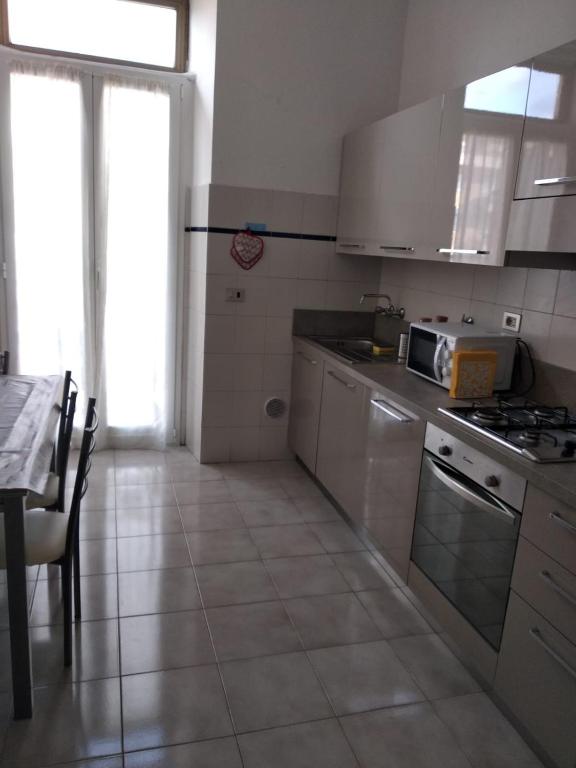 Kuchyňa alebo kuchynka v ubytovaní Casa Lucia