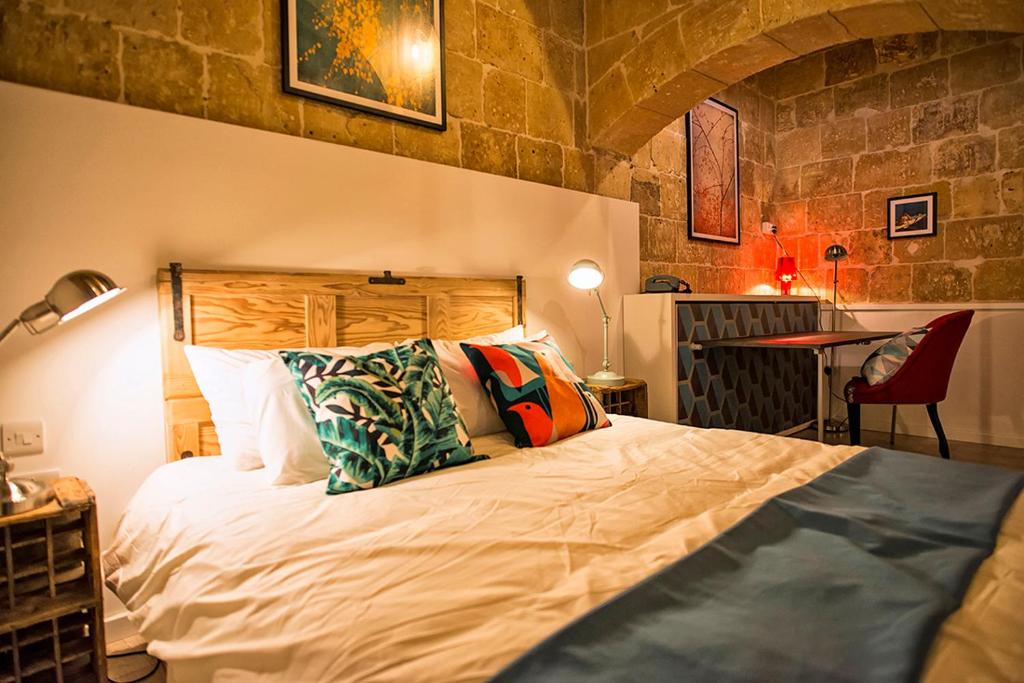 Postel nebo postele na pokoji v ubytování No 68 in Valletta