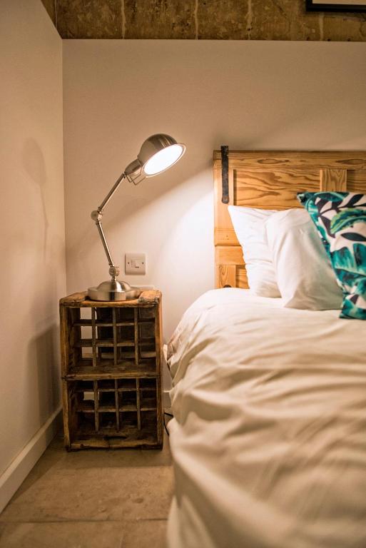 Postel nebo postele na pokoji v ubytování No 68 in Valletta
