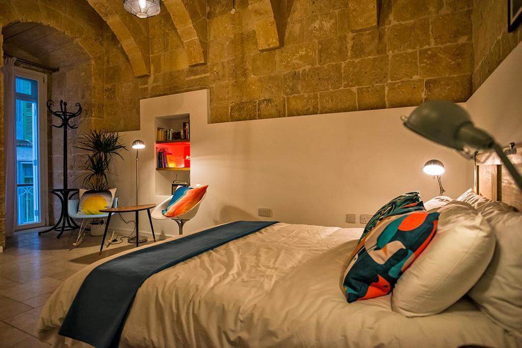 Postel nebo postele na pokoji v ubytování No 68 in Valletta