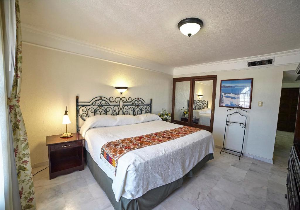 Postel nebo postele na pokoji v ubytování Hotel Francis Drake
