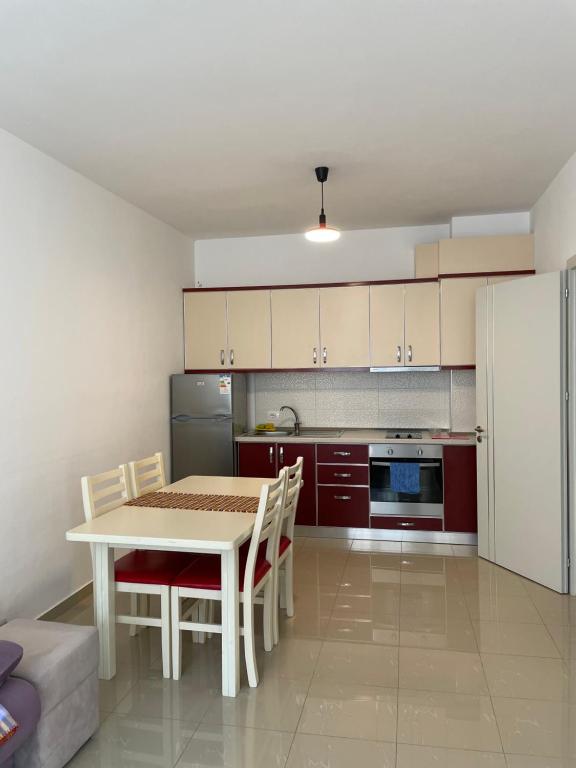 Kuchyň nebo kuchyňský kout v ubytování Nimfeum Apartments