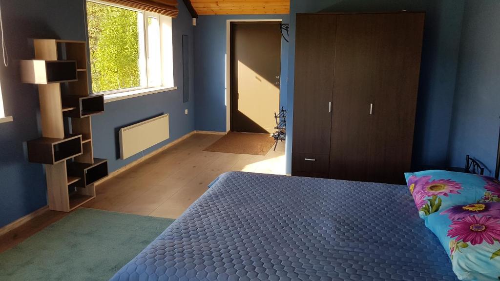 Postel nebo postele na pokoji v ubytování Vakari Puhketalu