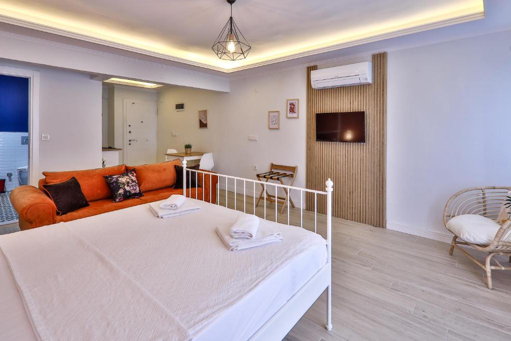 Postel nebo postele na pokoji v ubytování Yaz Apart Hotel