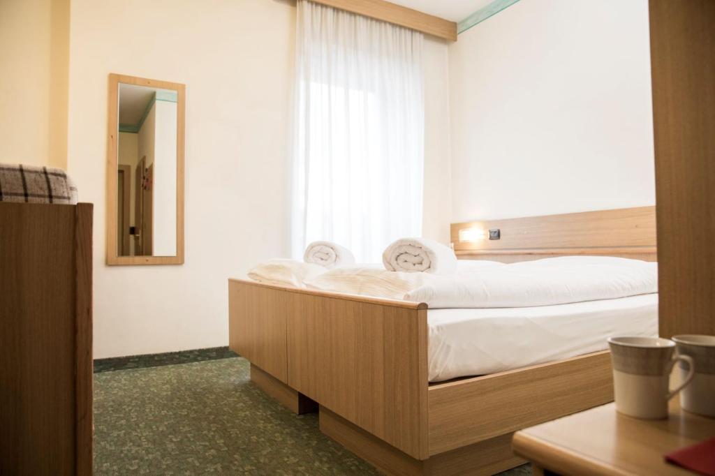 Postel nebo postele na pokoji v ubytování Active Hotel Rosat