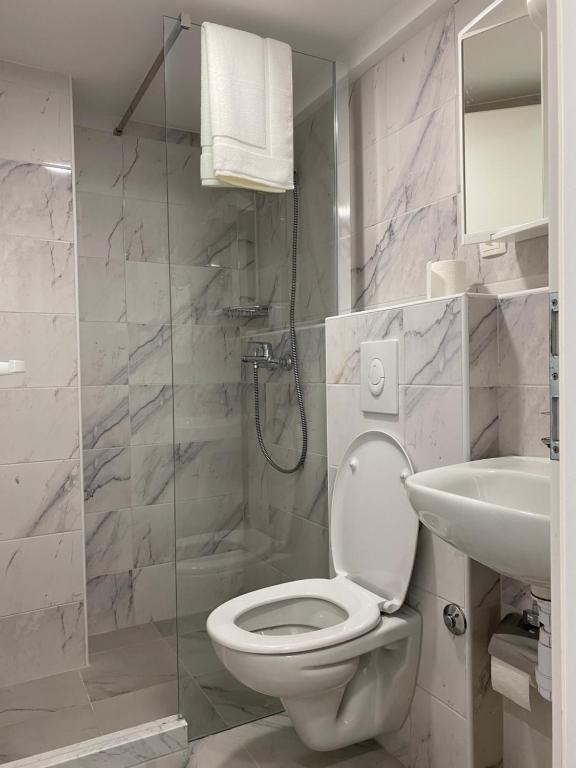 Kúpeľňa v ubytovaní Villa Leo Beach Studio