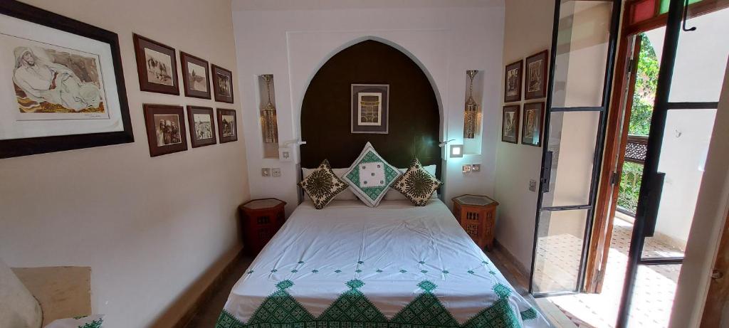Postel nebo postele na pokoji v ubytování Riad Barroko