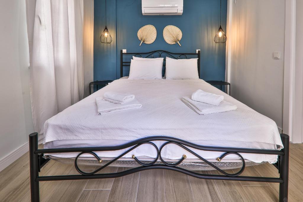 Postel nebo postele na pokoji v ubytování Yaz Apart Hotel