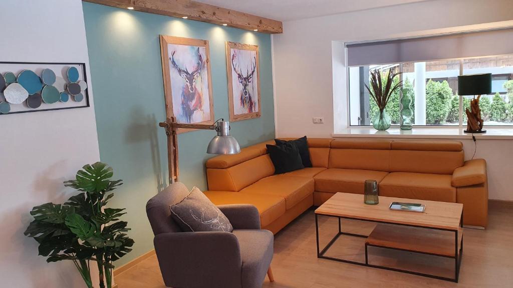 A seating area at Alpen Appartements Viehhofen near Saalbach & Zell am See - incl Sommercard
