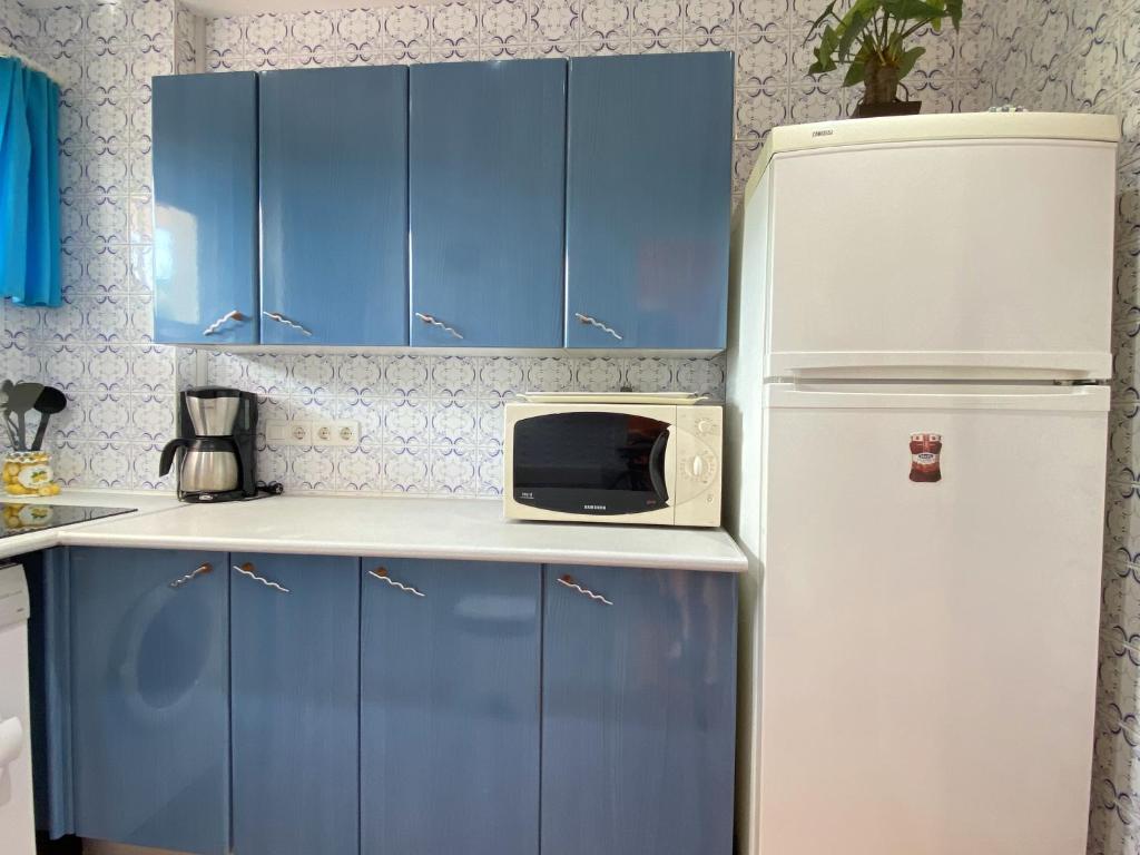 Kuchyňa alebo kuchynka v ubytovaní Acapulco 16 Apartments Casasol