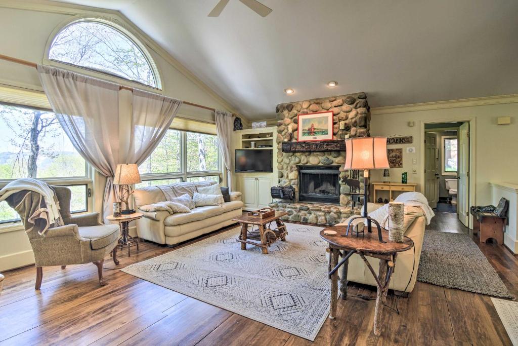 A seating area at Resort-Style Harbor Springs Home with Deck!