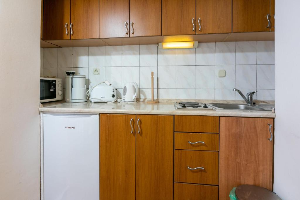 Kuchyňa alebo kuchynka v ubytovaní Apartments and Room Ruzica