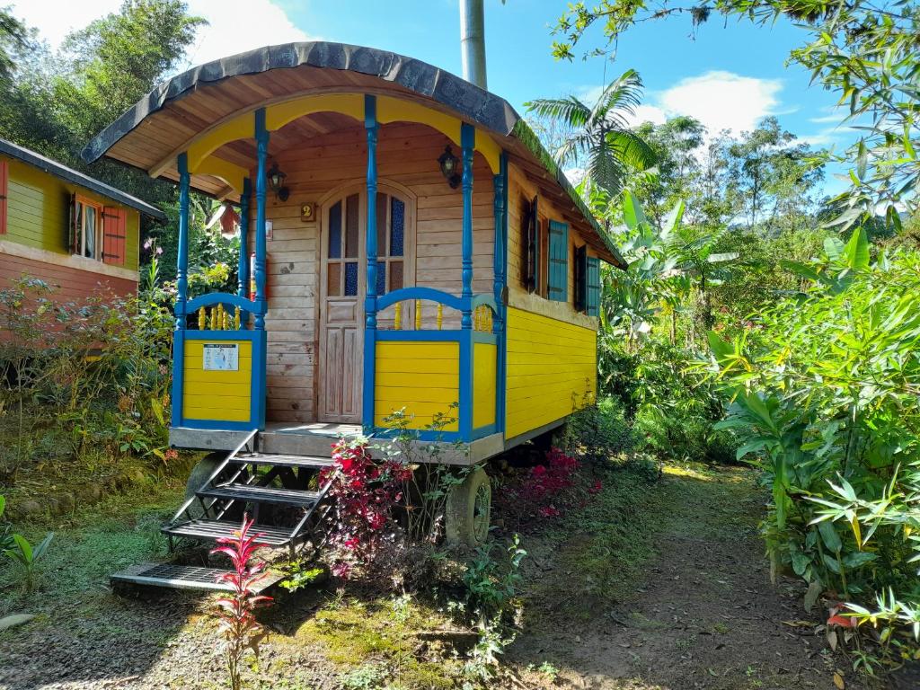 Zahrada ubytování Hosteria La Roulotte - Mindo