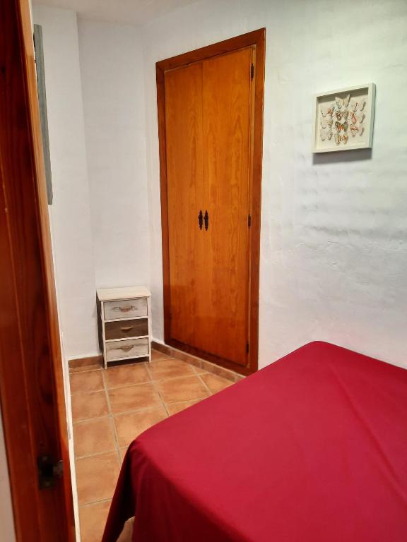 Postel nebo postele na pokoji v ubytování Zahara Pueblo