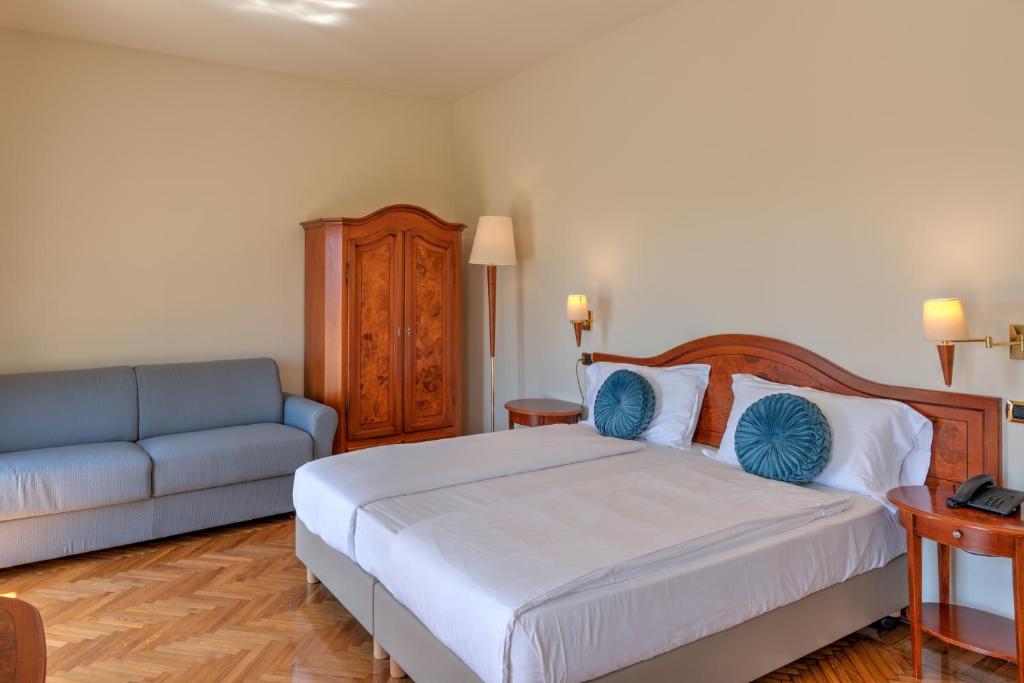Postel nebo postele na pokoji v ubytování Hotel Galeazzi