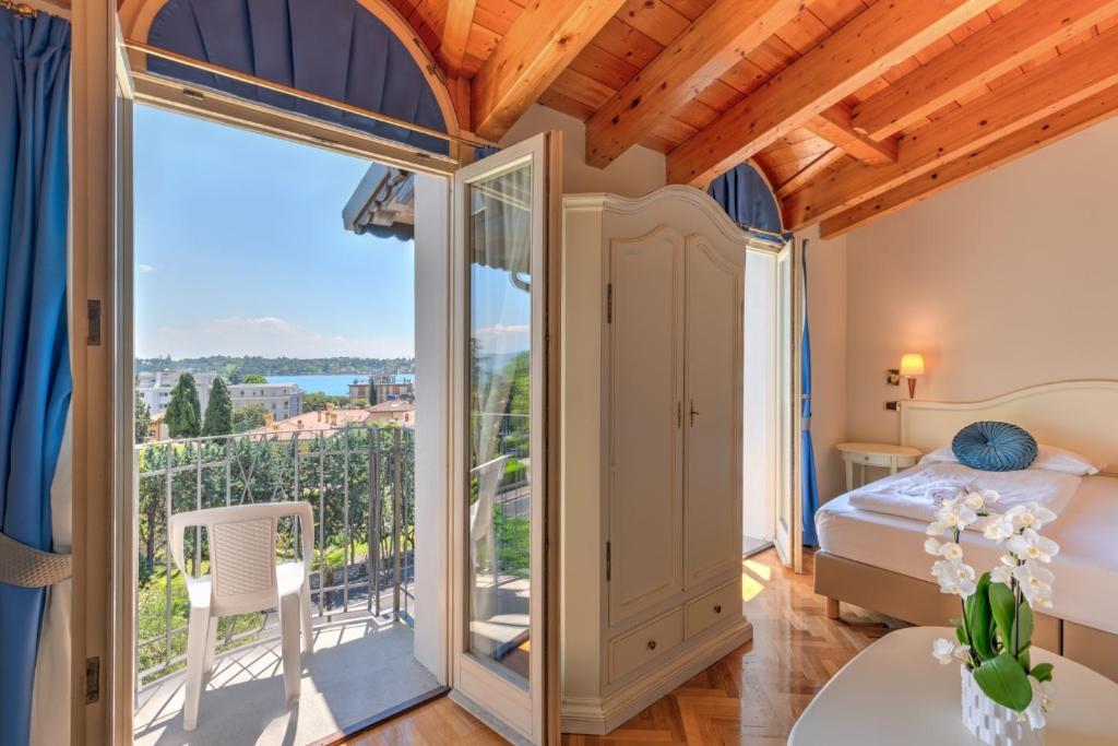 Postel nebo postele na pokoji v ubytování Hotel Galeazzi