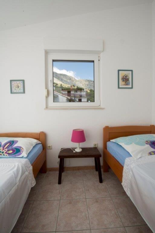 Posteľ alebo postele v izbe v ubytovaní Apartment in Duce with sea view, balcony, air conditioning, Wi-Fi (132-3)