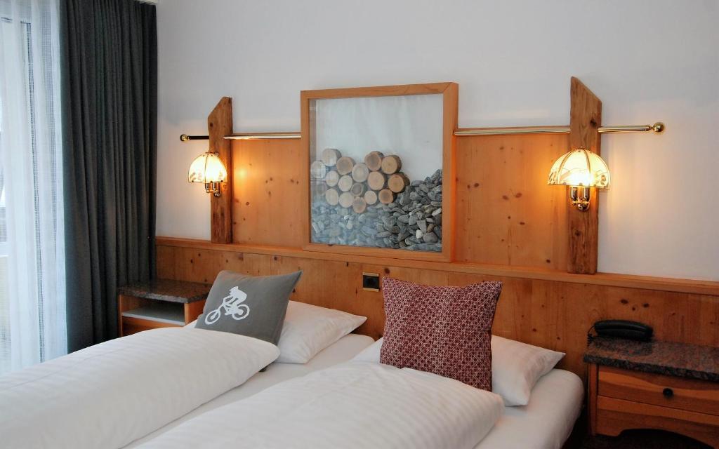 Postel nebo postele na pokoji v ubytování Hotel Crystal
