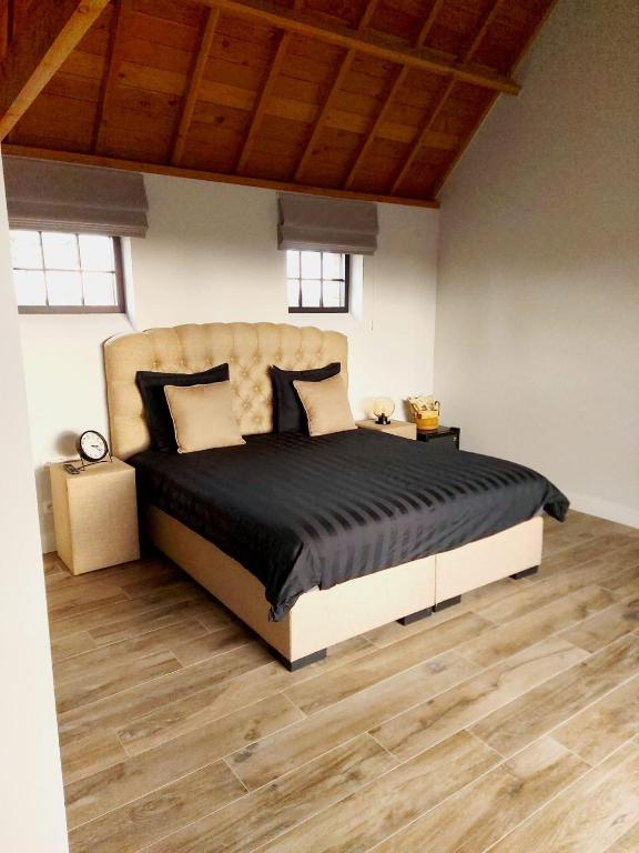 Postel nebo postele na pokoji v ubytování B&B Biesvenhof