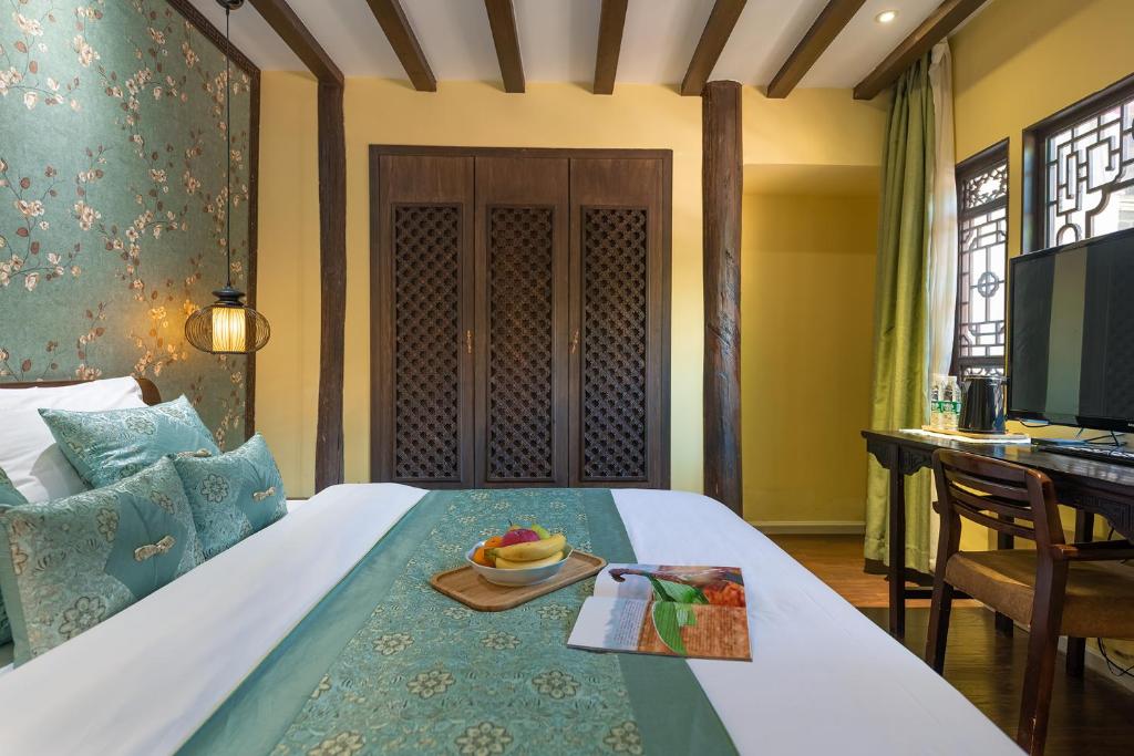 Fotografie z fotogalerie ubytování Lijiang Gui Yuan Tian Ju Guesthouse v destinaci Li-ťiang