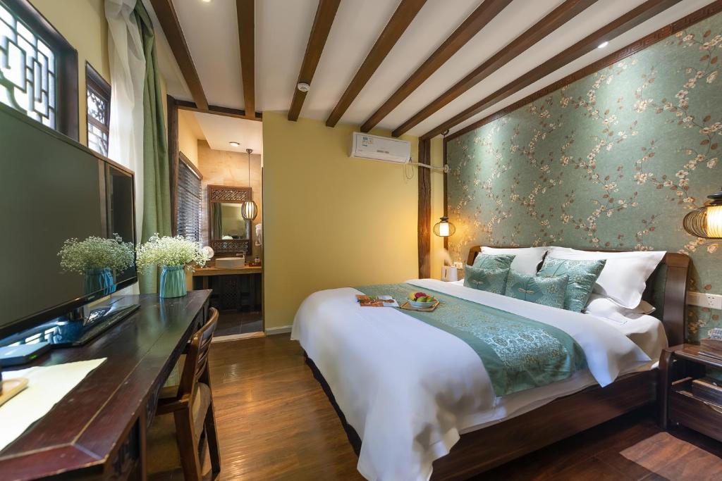 Fotografie z fotogalerie ubytování Lijiang Gui Yuan Tian Ju Guesthouse v destinaci Li-ťiang