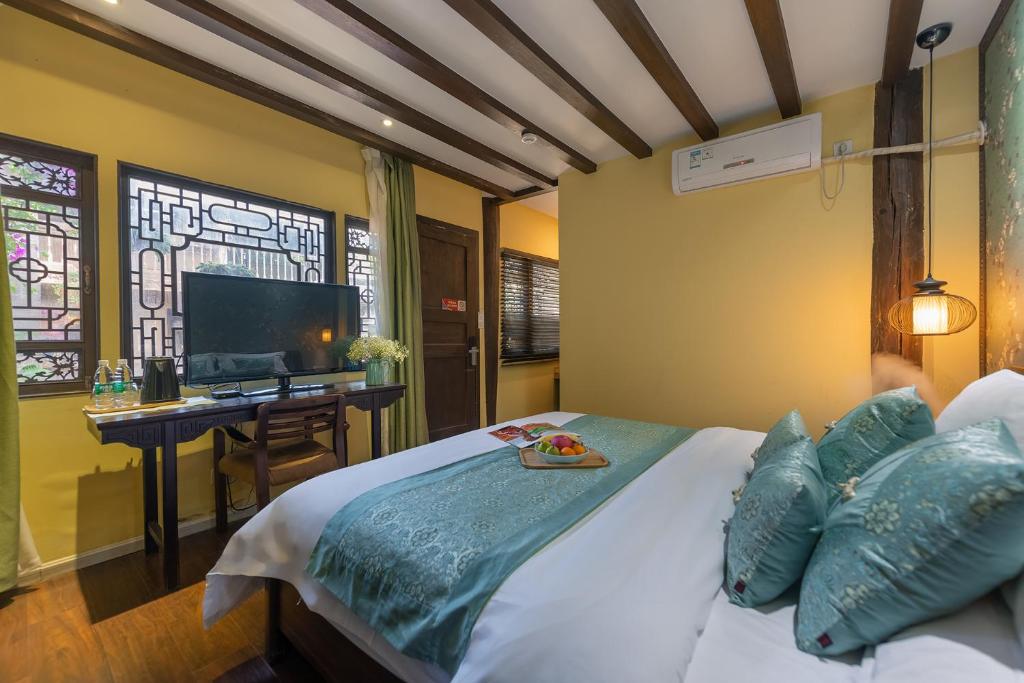 Fotografie z fotogalerie ubytování Lijiang Gui Yuan Tian Ju Guesthouse v destinaci Li-ťiang