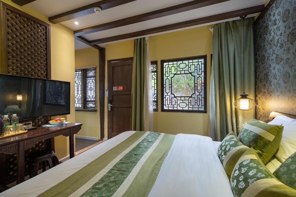 Fotografie z fotogalerie ubytování Lijiang Gui Yuan Tian Ju Guesthouse v destinaci Li-ťiang