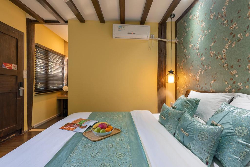 Fotografie z fotogalerie ubytování Lijiang Gui Yuan Tian Ju Guesthouse v destinaci Li-ťiang