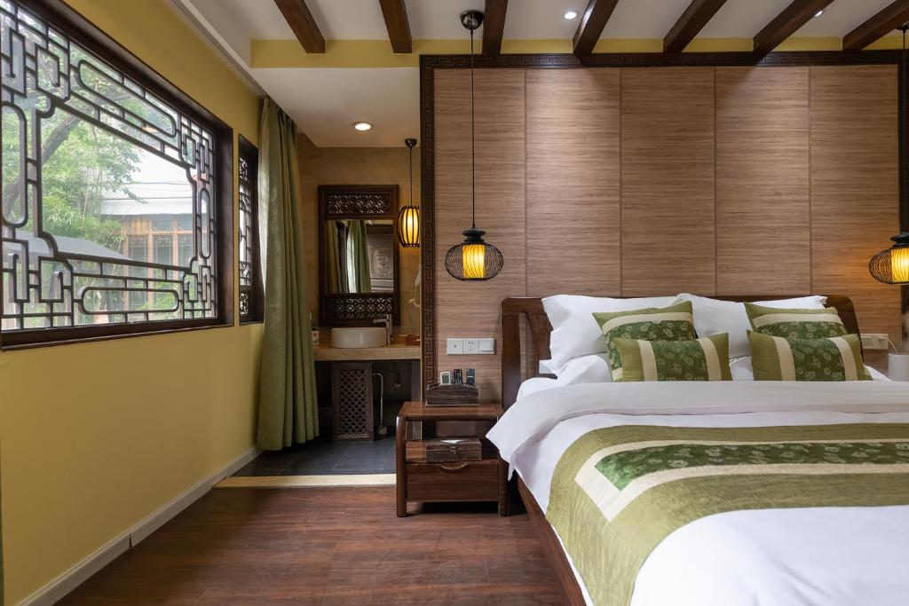 Fotografie z fotogalerie ubytování Lijiang Gui Yuan Tian Ju Guesthouse v destinaci Li-ťiang