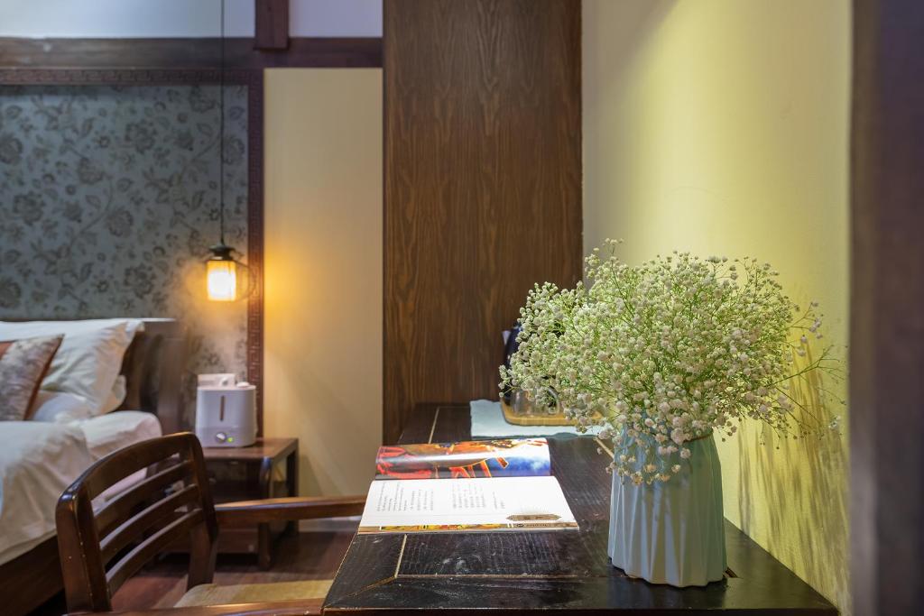 Fotografie z fotogalerie ubytování Lijiang Gui Yuan Tian Ju Guesthouse v destinaci Li-ťiang