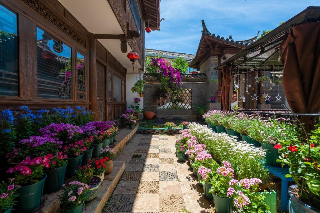Fotografie z fotogalerie ubytování Lijiang Gui Yuan Tian Ju Guesthouse v destinaci Li-ťiang